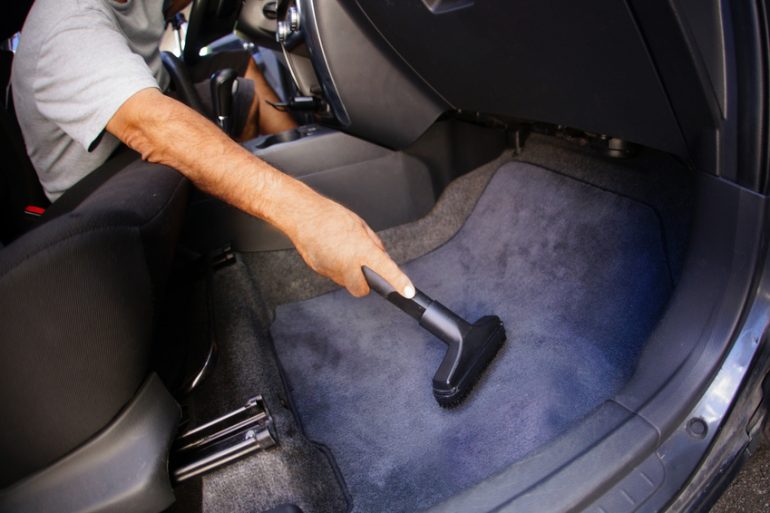 Car being vacuumed